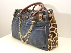 a handbag with a giraffe print design on the front and side pocket