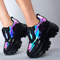 If You Long To Never Die Plug An And Upload Your Mind With The Anthony Wang X Lasr Exclusive Neuromancer Platform Sneakers. These Futuristic Rave Platform Sneakers Feature A Black Vegan Leather Upper With Iridescent Contrasting Detail, Pu Cable And Embossing Accents, An Easy Slip-On Style, Chunky Tread Bottoms, And Cushioned Hidden Interior Heel. With These Cute Sneakers The Party Never Has To End! Lasr Exclusive Neuromancer Platform Sneakers 2” Wedge Heel, 1” Platform Vegan Leather Outer Irides Cyberpunk Sneakers, Rave Techwear, Fantasy Sneakers, Anthony Wang Shoes, Cyberpunk Shoes, Futuristic Sneakers, Funky Sneakers, Iridescent Sneakers, Strange Shoes