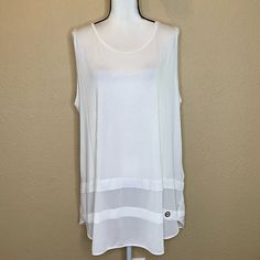 Brand New With Tag Plus Size Women’s 2x White Color Sleeveless Super Stretchy And Soft Sheer Hem ***It Does Have One Small Stain On Back Of Hem As Shown In Photo That I Didn’t Notice When I Bought It. I Have Not Tried To Get It Out Since The Top Is Brand New With Tag *** Quick Shipping! Summer Tank Vest For Layering, White Camisole Tank Top For Layering, White Layering Camisole Top, White Camisole Top For Layering, Casual Sleeveless Layering Tank Top, Sleeveless Summer Tank Top For Layering, Summer Sleeveless Tops For Layering, Sleeveless Summer Tops For Layering, Spring Layering Sleeveless Tank Top