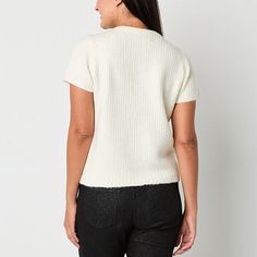 Crafted from a cozy, textured knit in a soft ivory hue, this Liz Claiborne women's short-sleeve pullover sweater is perfect for both casual and dressed-up looks during the cooler months. It's cut for a classic-fit and has a split crew neckline adorned with delicate, sparkling button details along the front placket. Wear yours with wide-leg pants and heels. Closure Type: ButtonFit: Classic FitNeckline: Split Crew NeckSleeve Length: Short SleeveApparel Length: 25 InchesFiber Content: 46% Polyeste… Color Crema, Small Sweater, Sweater White, Short Sleeve Sweater, Knit Short, Short Sleeve Pullover, Textured Knit, White Sweaters, Liz Claiborne