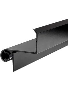 a black metal shelf with an opening on it