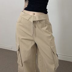 Product information: Style: Casual/Street/Punk/Vintage/Y2K/Hip Pop/Grunge/Preppy Color: Khaki. white Main fabric composition: Polyester Size: S.m.l Applicable gender: FemaleDescription:Elevate your style with our Fold Over Ruched Black Cargo Pants. These versatile pants effortlessly blend casual. street. punk. vintage. Y2K. hip-hop. grunge. and preppy styles. Available in khaki and white. these pants offer a variety of color options to suit your preferences. Crafted from high-quality polyester. they provide comfort and durability. Available in sizes S. M. and L. these pants are designed for a perfect fit. Suitable for females. these cargo pants are a fashionable addition to any wardrobe. Shop now and make a statement with your unique style.Size: Grunge Preppy, Street Punk, Skirt And Sneakers, Punk Vintage, Black Halter Dress, Black Cargo Pants, Black Cargo, Loose Sweater, Dress And Heels