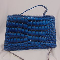 Geir Ness Laila Essense Of Norway Blue Purse $18 $99 Size: Os Geir Ness Euc - Geir Ness Laila Essense Of Norway Blue Purse Faux Leather Reptile Embossed Print. Snap Closure Short Handle With Removable Silver Chain Strap. Lower Purse 11" Wide By 6.5" High 2.5" Deep. Blue Evening Bags With Silver-tone Hardware, Blue Evening Bag With Silver-tone Hardware, Evening Blue Bags With Silver-tone Hardware, Blue Rectangular Formal Shoulder Bag, Formal Blue Rectangular Shoulder Bag, Blue Rectangular Shoulder Bag With Silver-tone Hardware, Rectangular Blue Bag With Silver-tone Hardware, Blue Rectangular Bag With Silver-tone Hardware, Formal Blue Shoulder Bag With Silver-tone Hardware