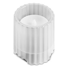 a white candle holder on a white background