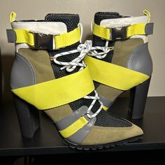 Steve Madden Illusion Multi Color Boots. Yellow/Neon Green, Black Mesh, Olive Green Suede, White And Dark Gray Accents, Silver Buckle, White And Olive Green Shoe Lace. These Are Size 8. I Am A True 7 1/2 And These Fit Me Perfectly. Gorgeous, Comfortable Boot. Yellow Lace-up Platform Boots, Yellow Ankle-high Spring Boots, Yellow High Heel Shoes For Fall, Yellow Pointed Toe Boots For Summer, Yellow Ankle Boots For Spring, Yellow High Heel Heels For Fall, Trendy Yellow Summer Boots, Yellow High Heels For Fall, High-top Yellow Boots For Spring