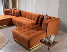 a living room with a couch, chair and coffee table