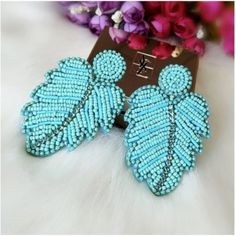 Large Turquoise Beaded Crystal Leaf Boho Chic Women's Fashion Party Earrings Brand New, Never Worn Metal: Zinc Alloy Measurements: 3.5in X 2.25in Light Blue Beaded Dangle Earrings For Party, Light Blue Beaded Drop Earrings, Blue Bohemian Beaded Earrings With Large Beads, Bohemian Blue Beaded Earrings With Large Beads, Turquoise Beaded Earrings For Party, Light Blue Beaded Earrings For Party, Adjustable Turquoise Beaded Earrings For Party, Turquoise Round Bead Earrings For The Beach, Blue Beaded Earrings For The Beach