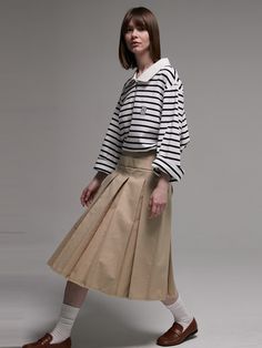 Editor's NotesThe AEER's cotton pleats skirt is shaped to pleats design in A-line with a low-cut hemline and midi-length, made from high-density cotton blending fabric with a twill structure. It has a belt from the same fabric as the body fabric and a side zipper, and it is lightweight and sturdy, so it is good to wear in spring and early summer. - Pleats design & midi length- A-line - Low-cut hemline - High-density cotton blending fabric with a twill structure- Belt from the same fabric as the body fabricMeasurements(in.)Size: Size (S/M/L)- Waist: 13.38in. / 14.37in. / 15.15in.- Hip: 18.11in. / 19.09in. / 20.07in.- Total Length: 27.55in. / 27.95in. / 27.95in. *Model info: Height 5' 7,  Bust 31in., Waist 24in., Hips 34in. / Wearing a size S  &nbs Classic Cotton Pleated Waist Skirt, Cotton Accordion Pleated Skirt, Classic Cotton Pleated Skirt With Accordion Pleats, Spring Cotton Skirt With Accordion Pleats, Classic Cotton Pleated Lined Skirt, Classic Cotton Pleated Skirt For Spring, Cotton Pleated Skirt With Voluminous Flared Shape, Cotton Skirt With Accordion Pleats For Work, Fall Cotton Pleated Midi Skirt