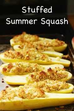 stuffed summer squash on a baking sheet with text overlay that reads stuffed summer squash