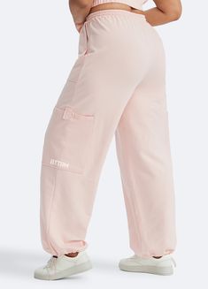 Embrace roomy wide legs and a stretchy fit for ultimate comfort, paired with a flattering high waist for added style. Whether it's grocery runs, lazy Sundays, or a casual hangout, these joggers have you covered in relaxed elegance. Parachute Pants With Cargo Pockets For Loungewear, High Waist Relaxed Fit Comfortable Pants, Comfortable High-waist Pants With Relaxed Fit, Relaxed Fit Yoga Pants With Side Pockets For Loungewear, Comfortable High-waist Relaxed Fit Pants, Comfortable High Waist Relaxed Fit Pants, Athleisure Parachute Pants With Side Pockets For Loungewear, Cotton Parachute Pants For Loungewear, Baggy High Waist Cargo Pants For Loungewear