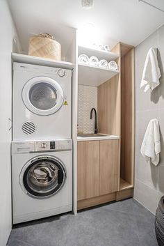 a washer and dryer in a small room