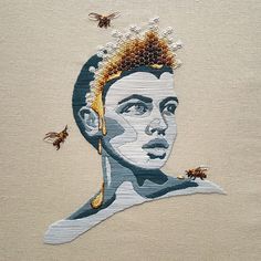 an embroidered portrait of a man with bees on his head and in the background he is surrounded by honeybees