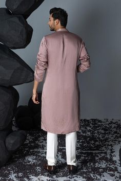 Mauve linen silk kurta with crystal embroidered leaf patterns. Comes with pant.
Components: 2
Pattern: Embroidered
Type Of Work: Crystal
Neckline: Mandarin Collar
Sleeve Type: Full
Fabric: Linen silk
Color: Purple
Other Details: 
Straight silhouette
Weight: 800 kgs
Occasion: Mehendi and Puja - Aza Fashions Eid Designer Linen Sets, Linen Sets For Designer Wear At Eid, Linen Sets For Designer Wear On Eid, Linen Sets For Eid Designer Wear, Designer Linen Kurta For Eid, Elegant Linen Kurta With Resham Embroidery, Festive Unstitched Linen Kurta, Festive Elegant Linen Kurta, Unstitched Linen Kurta For Eid