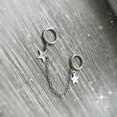 ♥Simply♥Dainty♥Everyday♥Minimal♥ 925 sterling silver  Earrings gauge: 22 gauge/0.64mm 20 gauge/0.8mm  Earrings inner diameter: 6mm Chain length: 33mm If you need different inner diameter or chain length, please contact me, thank you. Earrings are priced individually. ---------------------------------------------------------- 14k gold filled Anyone who can wear gold can wear gold filled without worries of any allergic reaction to the jewelry.  Gold filled jewelry is an economical alternative to s Silver Piercings With Star Charm As Gift, Silver Grunge Pierced Earrings, Silver Dangle Punk Cartilage Earrings, Silver Punk Cartilage Earrings, Gothic Silver Jewelry With Star Charm, Chain Industrial, Gold Meaning, Earring Piercing, Industrial Earrings