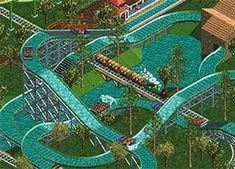 an aerial view of a roller coaster at the theme park, including a train and water slides