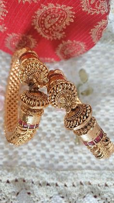 Closure:- Screw Type- Gold Plated Openable Antique Gold Bangles bangle/Indian Bangles/Antique gold Kada/Kundan bridal bangles set/Gold Kada/Indian bangles Bracelets Beautiful bangles with Intricate handcrafted perfect for all occasions gifting. Sizes available 2.4 inch, 2.6 inch and 2.8 inch. Sold as pair. Latkans Bracelets For Wedding And Navratri, Wedding Bracelets With Latkans For Navratri, Festive Bollywood Bangle With Latkans, Festive Diwali Bangle With Latkans, Round Bangle For Diwali Rituals, Festive Kundan Bangle With Latkans, Bollywood Style Kundan Bangle With Latkans, Diwali Ritual Round Bangle, Gold Bracelets With Latkans For Wedding