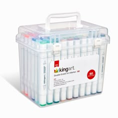 a plastic container filled with markers and pens