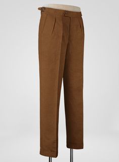 Achieve a masterclass in sartorial consistency by opting for our Italian Prato Rust Linen Highland Trousers. Further, the trousers are crafted from a pure linen fabric that portrays a sturdy, sleek nature and airy feeling while pairing a solid finish over a rust tone. Nevertheless, the cloth is admiringly breathable, a reliable option for summer events on the horizon. Later, Seal the sartorial grandeur with precisely tailored trousers that hold the suave standards with a signature fit that looks Classic Straight Leg Linen Dress Pants, Formal Solid Linen Pants, Classic Linen Straight Dress Pants, Classic Straight Linen Dress Pants, Classic Linen Pants With Welt Pockets, Classic Linen Dress Pants With Welt Pockets, Classic Brown Pants For Tailoring, Tailored Full-length Linen Pants, Classic Linen Pants For Business Casual