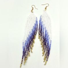 Amazing Handmade Long Beaded Statement Earrings With White, Purple, Periwinkle And Gold Seed Beads In A Gorgeous Angel Wings Pattern. The Longest Strand Is 6 Inches Long. Finished With Hypoallergenic Gold Plated Ear Hooks. * Unique Spring Break Accessory * Get Lots Of Compliments At Your Next Party * Wow Your Partner On Date Night Brand Name Hand Crafted Handcrafted By Me So Each Piece Is Brand New And One Of A Kind. Your Item Is Beautifully Packaged With Care And Shipped The Same Or Next Busine Adjustable White Beaded Earrings, Angel Wings Pattern, Spring Break Accessories, Angel Wings Earrings, Wings Pattern, Purple Periwinkle, Wire Earrings Handmade, Beautiful Beaded Earring, White Topaz Earrings