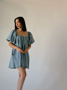 Summer Puff Sleeve Medium Wash Dress, Summer Medium Wash Puff Sleeve Dress, Puff Sleeve Denim Dress For Day Out, Denim Dress With Puff Sleeves For Day Out, Denim Puff Sleeve Dress For Day Out, Spring Puff Sleeve Medium Wash Dress, Denim Square Neck Mini Dress For Summer, Denim Puff Sleeve Mini Dress For Summer, Medium Wash Denim Dress With Square Neck