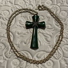 "Vintage Green Cross Necklace Juliet Faux Jade Pendant on Gold Tone 24\" chain. 1970's Avon. In good vintage condition. Please enlarge pictures to see details. Bright gold tone chain. 24\" chain comes off easily with C ring clasp so that it can be used with your other pendants.  Versatile chain and cross in good condition. See and enlarge photos for condition.  Vintage item shows some age and wear.  All items sold as is, as pictured.  US Domestic shipping only.  All sales final." Jade Cross Necklace, Vintage Cross Chain Jewelry, Vintage Cross Pendant Jewelry With Adjustable Chain, C Ring, Bright Gold, Jade Pendant, Cross Necklace, Jewelry Necklace Pendant, Pendant Necklaces