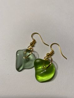 Earrings made from glass found on the shores of Lake Superior in Duluth, MN Green Dangle Earrings With Recycled Glass, Green Recycled Glass Dangle Earrings, Green Dangle Earrings In Recycled Glass, Green Sea Glass Earrings With Ear Wire, Handmade Sea Glass Green Earrings, Green Sea Glass Earrings For Gift, Green Dangle Glass Earrings, Green Glass Dangle Earrings, Green Recycled Glass Earrings For Beach