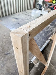 a wooden table with tools on top of it