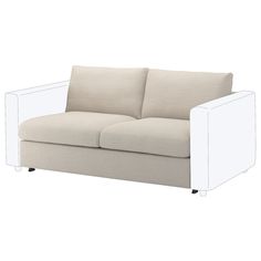 a white couch sitting on top of a wooden floor