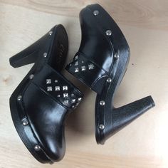 Chaps Womens Susanah Black Studded Platform Mule Heels Size 8.5b Slip On Nwt Embellished 1" Platform 4" Heel Box Does Not Have A Lid. Black Pointed Toe Clogs With Stacked Heel, Chic Black Clogs For Party, Black High Heel Clogs With Padded Heel, Black Formal Clogs With Padded Heel, Formal Black Clogs With Padded Heel, Black Party Platform Clogs, Leather Clogs With Round Toe For Party, Leather Round Toe Clogs For Party, Black Round Toe Clogs For Party