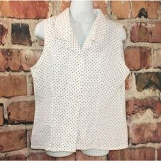 Vintage Gitano size large sleeveless white with black polkadots shirt Button front with darted front and back In good pre-owned condition with no notable flaws Please view all photos for sizing measurements Please note, all orders are shipped withing 3 BUSINESS days of payment received. Weekends and holidays are not considered business days. Casual Fitted Sleeveless Blouse, Summer Polka Dot Pattern Blouse With Buttons, Polka Dot Blouse With Buttons For Summer, Summer Polka Dot Blouse With Buttons, Casual Polka Dot Tops With Buttons, Summer Polka Dot Tops With Button Closure, Polka Dot Tops With Button Closure For Summer, Summer Polka Dot Collared Blouse, Classic Fitted Polka Dot Blouse