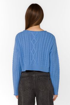 This classic sweater features long sleeves, a mock neck, a cropped fit, and a luxurious cable knit design. Wearable on its own and can be layered on a chilly day . Material: 60% Cotton and 40% Acrylic Machine wash warm Color: Baja Blue Model is 5'9" and wearing a size S Imported Blue Fitted Soft Knit Sweater, Cozy Blue Cropped Soft Knit Sweater, Blue Long Sleeve Cropped Soft Knit Sweater, Blue Textured Knit Cotton Sweater, Blue Fitted Textured Knit Sweater, Classic Sweater, Blue Sweater, Cami Tanks, New Tops