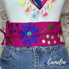 Color it up with one of our beautiful Mexican Belts for a chic western look. Made of 100% cotton with adjustable tie straps. Can be tied to the side, back or front. All belts are hand made and each design is unique. Available in two floral designs and solids. See our collection of belts here. Match it with one of our other Mexican Accessories: Espadrilles, Necklace, Shawl or Mexican Clutch. Perfect for any Mexican Themed party celebration. MEASUREMENTS: 3 1/2" Wide x 31" Long plus tie strapsTie Spring Festival Fabric Belt, Embroidered Belt For Summer Beach, Summer Beach Embroidered Belt, Adjustable Belts For Spring Festival, Casual Embroidered Belt For Spring, Mexican Belts, Mexican Belt, Mexican Accessories, Mexican Themed Party