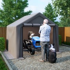 a man standing next to a dog in front of a small shed with a lawn mower