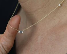 **Our diamonds are 100% REAL, natural earth mined** Pendant with 0.30 Carat of baguette-cut diamonds mounted in 14K Yellow Gold. non-traditional necklace with stunning horizontal baguette diamond that you will never take off! Setting -Total Carat Weight: 0.34 -14K White Gold -Size: Resizeable -Certificate Of Authenticity Included by www.gil-lab.com Main Diamond: -Round Brilliant -0.34 Carat -Color: F -Clarity: VS -Clarity Enhanced I would like to inform you that there may be a deviation of about Gold Necklace Diamond, Traditional Necklace, Oval Diamond Engagement, Natural Diamond Ring, Necklace Diamond, Art Deco Necklace, Personalized Pendant, Yellow Gold Engagement, Baguette Cut Diamond