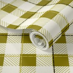 a close up view of a wallpaper with yellow and white checkerboard pattern