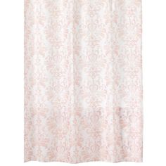 a shower curtain with pink and white damaske pattern on it's side