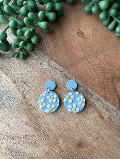 Stud earring made from Polymer clay. Abstract daisy design with pale blue earring. Light Blue Clay Earrings, Blue Everyday Flower Jewelry, Cute Blue Polymer Clay Earrings, Blue Dangle Flower Earrings In Polymer Clay, Cute Handmade Light Blue Earrings, Blue Clay Earrings, Clay Abstract, Blue Clay, Daisy Design