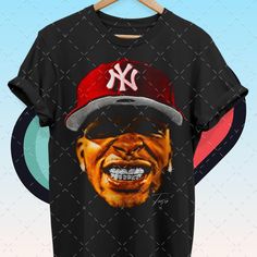 a t - shirt with the image of a man's face wearing a baseball cap