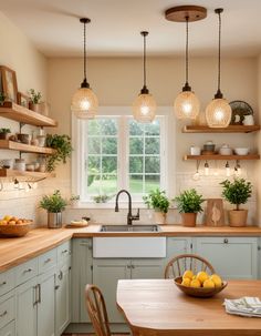 a kitchen filled with lots of counter top space next to a dining room table and chairs