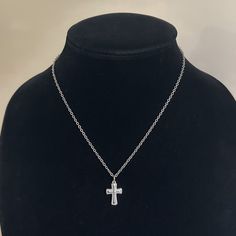 The Dainty Cross Necklace in silver 🤍 Featuring a unique silver cross with dot details and a stainless steel oval link chain. shower proof!  Unisex & tarnish proof- 16" 🖤 each will come with an extender for adjustability.  Made with love 🫶 Silver Chain Necklace With Cross Pendant, Sterling Silver Cross Chain Necklace With Adjustable Chain, Stainless Steel Silver Cross Chain Necklace, Silver Cross Necklace With Clavicle Chain, Silver Metal Cross Necklace With Clavicle Chain, Silver Cross Necklace With Chain Pendant, Silver Cross Necklace With Chain, Silver Crucifix Cross Necklace With Chain, Silver Cross Chain Necklace