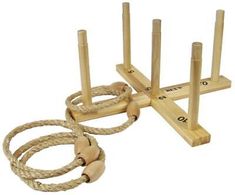 a set of four wooden poles and ropes