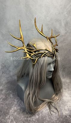 This  exquisitely hand sculpted and versatile idolatre original crown is the perfect finishing touch to a wide variety of different costumes ranging from feral forest deities to elven royalty, druids to dryads- and beyond. Each side frames the face with organic antler shapes rising into tines like spires circling the crown. The entire headdress is hand painted with painstaking attention to detail. A plush backed elastic strap at the nape of the neck is easily adjusted with a slider- no messy tie Elven Royalty, Antler Crown, Drag Queen Costumes, Dark Fairy, Unicorn Horn, Costume Hats, Fantasy Clothing, Beautiful Tattoos, Headdress