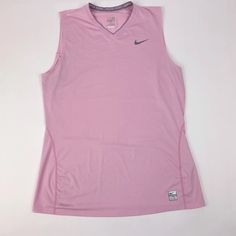 V-Neck Beautiful Pink Color Some Small Dirt/Marks On Front Sleeveless New With Tags Inventory: Vv 1422 Pink V-neck Athleisure Top, Nike Sporty Sleeveless Vest, Nike Sleeveless Sports Vest, Spring Athleisure V-neck Tank Top, Spring V-neck Athleisure Tank Top, Nike Casual Sleeveless Vest, Casual Nike Sleeveless Vest, Nike Sleeveless Tank Top For Sports, Pink V-neck Sports Top