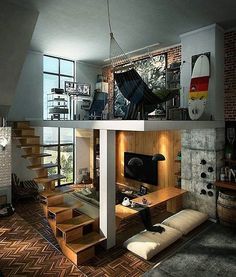 a living room filled with furniture next to a staircase leading up to a second story