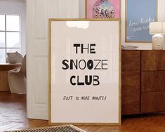 there is a sign that says the snooze club just no more minutes