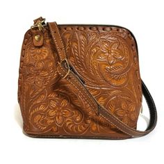 This rustic Hand Tooled Leather Bag, adorned with a stunning chiseled artisan design, adds a touch of vintage elegance to your daily ensemble. Ideally sized to hold all your essentials, this purse is handcrafted with love and care by skilled artisans, offering a unique rustic charm seldom found in commercial stores. Crafted from genuine cowhide leather and best for casual and everyday wear.  🌹height: 17 cm. 7 inch 🌹width : 18 cm.  7.2 inch 🌹base: 8 cm.    3.2  inch  Adjustable and detachable Vintage Embossed Shoulder Bag For Daily Use, Brown Embossed Shoulder Bag For Everyday, Vintage Brown Embossed Shoulder Bag, Vintage Brown Embossed Satchel, Vintage Engraved Satchel Bag, Brown Embossed Satchel Bag, Vintage Engraved Bags For Everyday Use, Brown Embossed Shoulder Bag, Brown Engraved Bags For Everyday Use