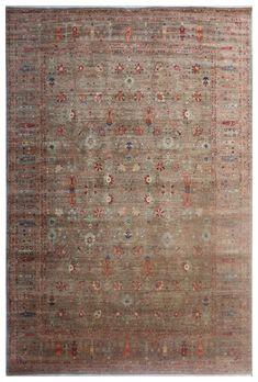 an antique rug with many different colors and patterns