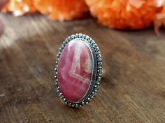 Handmade Rhodochrosite bohemian ring , you can wear this ring as a party wear ring .. Title - Rhodochrosite stone ring Stone color - Pink Stone shape - Oval Material - Sterling silver 925 Note - We use natural gemstones, so color shade may be little bit different .. we are giving you best quality rings on best price .. contact us for more quantity Bohemian Handmade Oval Ruby Ring, Handmade Bohemian Oval Ruby Ring, Handmade Unique Pink Ruby Ring, Handmade Pink Oval Ruby Ring, Bohemian Pink Gemstone Rings, Unique Handmade Pink Ruby Ring, Handmade Bohemian Ruby Ring, Handmade Bohemian Pink Ring, Handmade Pink Ruby Ring In Sterling Silver