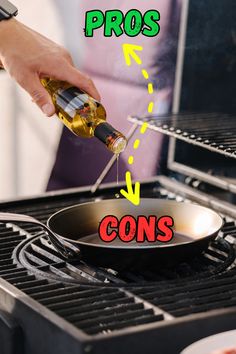 a person pouring olive oil into a frying pan on top of an outdoor grill