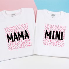 "Matching Family Shirt,  Mama Shirt, Mini Shirt, Mothers Day Gift, Mommy And Me Shirt, Custom Family Tee,  Mum and Child twinning t-shirt set, Pink Leopard Mamacita and Minicita design T-shirts. Mama and Mini T-Shirts, Mommy and Me shirts, Mommy and Mini Tee Set, Trendy tees, Trendy Moms, Christmas Gift Our t-shirts are made of premium quality cotton blend for a great quality soft feel and comfortable retail fit.  They are modern fitted, stylish and we use high-quality vinyl ensuring your garment will look fantastic. SIZE GUIDE T-shirts For Kids: 1/2* -24\" |  2/3 -25\" |   3/4 -26\" |   5/6 -28\" |   7/8 -30\"  |  9/11 -32\" |   12/13 -34\"  |  14/15 -36\" Baby bodysuits: first size- 9lbs 4kg   |   0-3 months - 12lbs 5.5 kg   |   3-6 months 18lbs 8kg   | 6-9 months 21lbs 9.5kg   |   9-12 White Printed Tops As A Gift, Mother's Day Pink Printed Tops, Pink Printed Tops For Mother's Day, White Tops With Funny Print For Gift, White Tops With Name Print For Gift, Printed Pink T-shirt As Gift, Pink Printed T-shirt As A Gift, White Top With Funny Print For Mother's Day, Mother's Day White Shirt With Screen Print